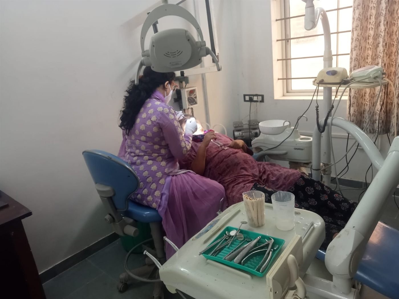 A patient receiving treatment at the Seva Tirth centre