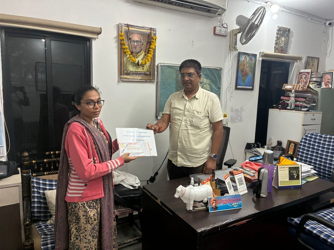 A second trainee receiving her certificate at the centre